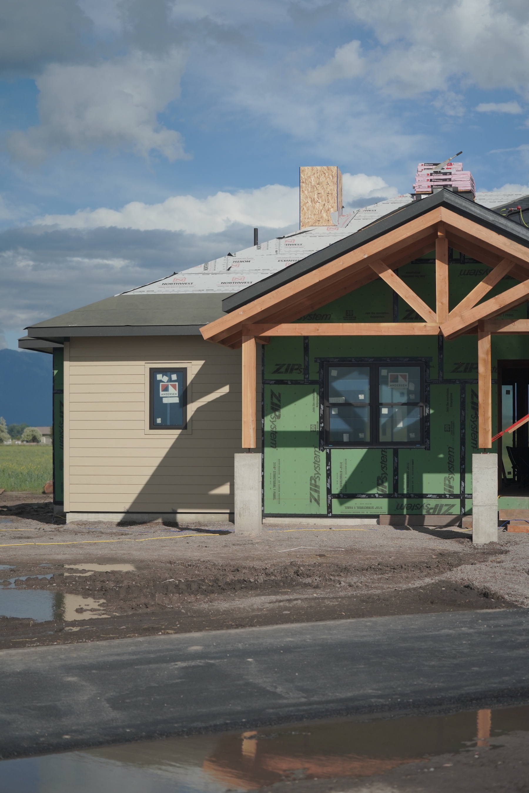 Porter Ranch 5 Front Porch Timber Framing by Kalispell's premier custom home builder